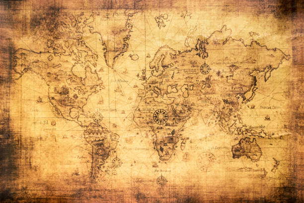 mappa del mondo vintage su una vecchia pergamena macchiata - compass exploration map globe foto e immagini stock