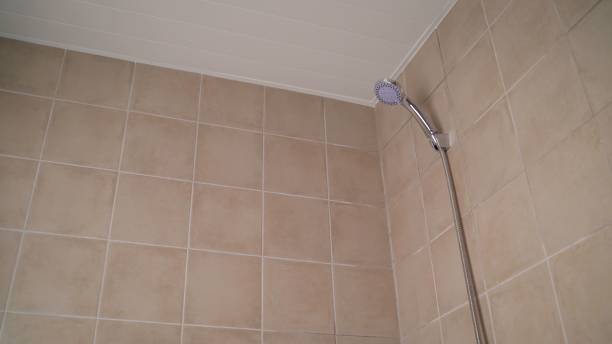 istock Shower in the bathroom. Luxurious fully tiled shower with hand shower. 1301146207