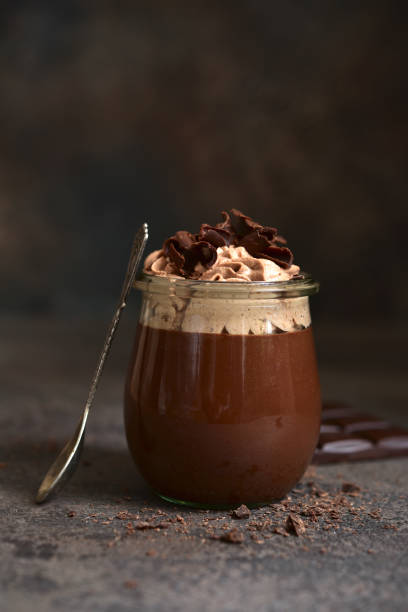 istock Delicious chocolate mousse or pudding with whipped cream 1301146486