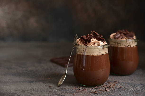 istock Delicious chocolate mousse or pudding with whipped cream 1301146501