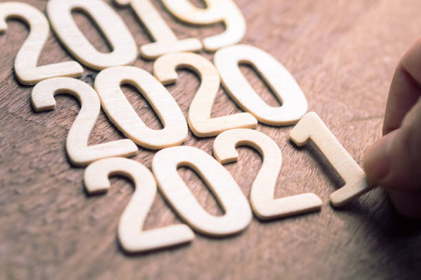 2021 Year Plan Hand arrange wooden numbers as running year to 2021 on wood table 2019 stock pictures, royalty-free photos & images