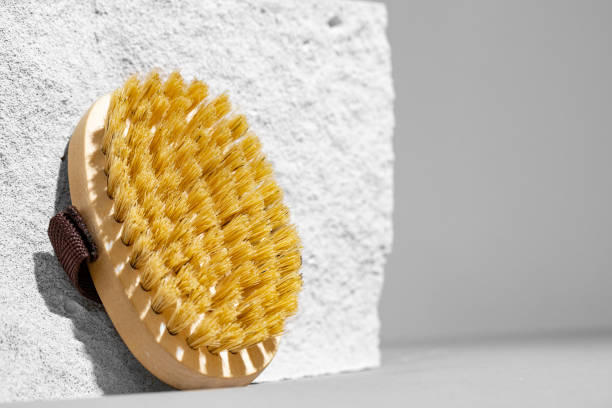istock Skincare massage brush on gray concrete block 1301149581