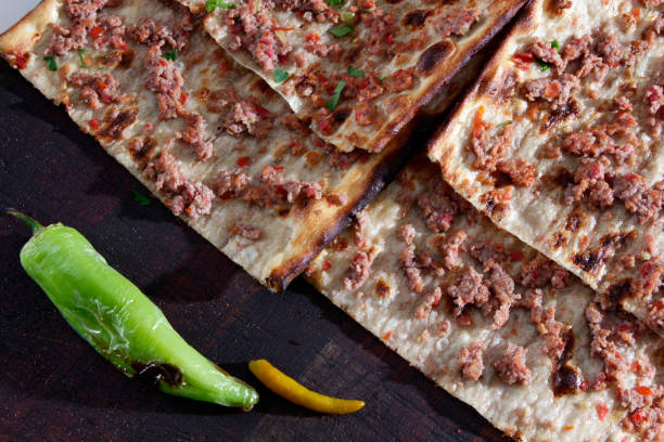istock Turkish traditional minced meat pide. Turkish pizza, Etliekmek. 1301150115