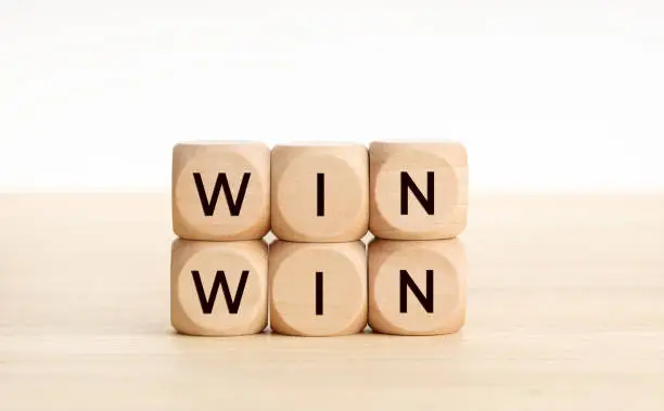 Photo of Win Win word on wooden blocks on wood table