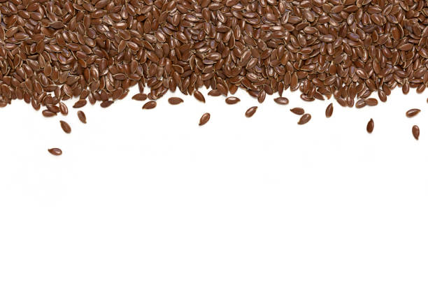 istock Flax seeds on a white background. Copy space, flat lay 1301153486
