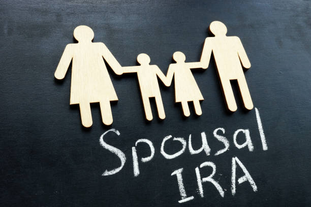 istock Spousal IRA retirement plan and family figures. 1301153630
