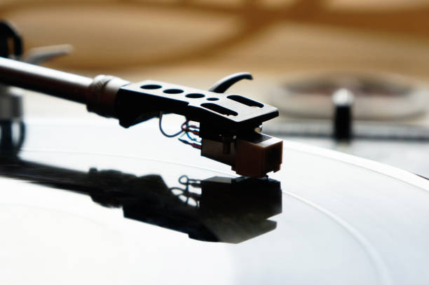 istock Vinyl player for vinyl discs. Needle on vinyl record 1301153784