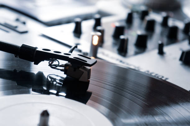istock Vinyl player for vinyl discs. Needle on vinyl record 1301153798