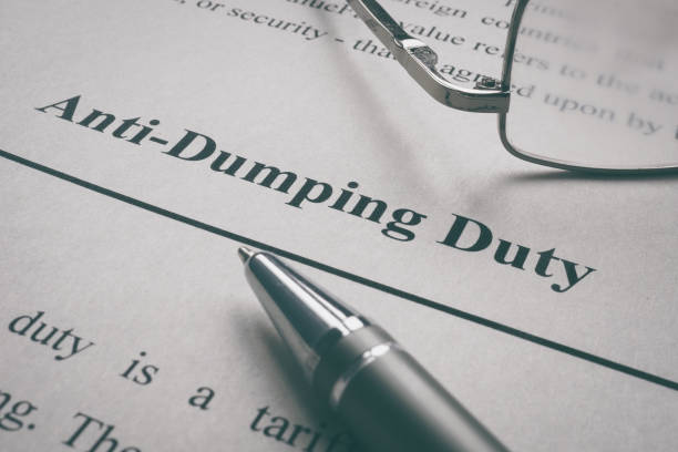 istock Anti-Dumping Duty words on the page and glasses. 1301153863