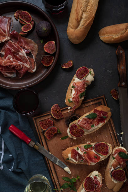 istock Wine and Tapas with ham, top view 1301155738