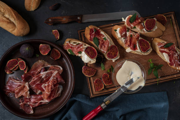 istock Tapas with ham and cream cheese. top view 1301155740