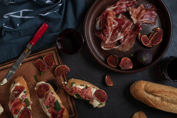 istock Wine and Tapas with ham, top view 1301156015