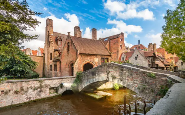 Photo of Old famous canal bridge in Bruges Belgium.