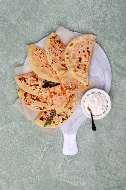 istock Baked bread with vegetable filling 1301161066