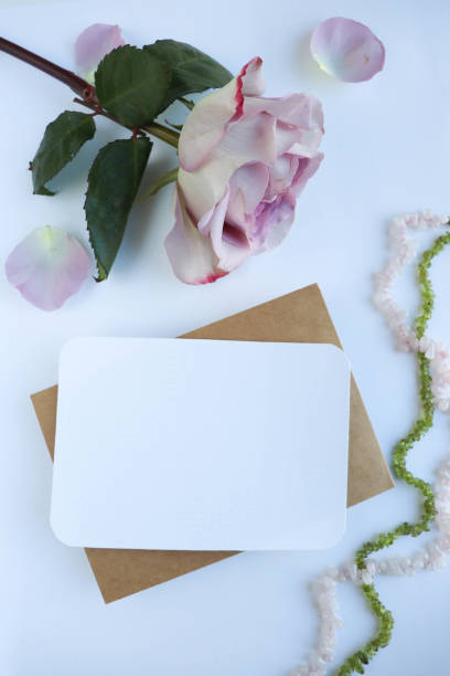 istock bouquet of flowers, envelope and place for text 1301161632