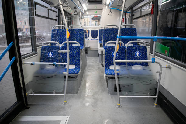 istock Empty bus interior. Blue seats without passengers. Public transport. Transportation of passengers by public transport. Ergonomic interior of the bus. Travel to other cities. 1301162250