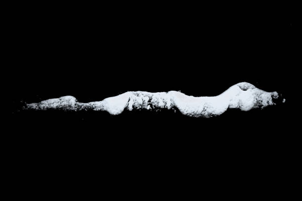 istock white snow isolated on a black background. Winter elements for design 1301164375