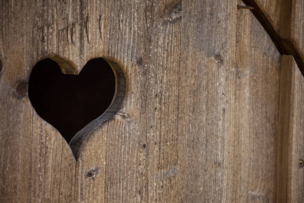 hearth shape over a wooden balcony in a small alpine cabine