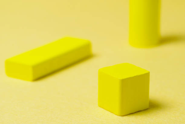 istock abstract colors. yellow colored shapes on a yellow background. 1301165713