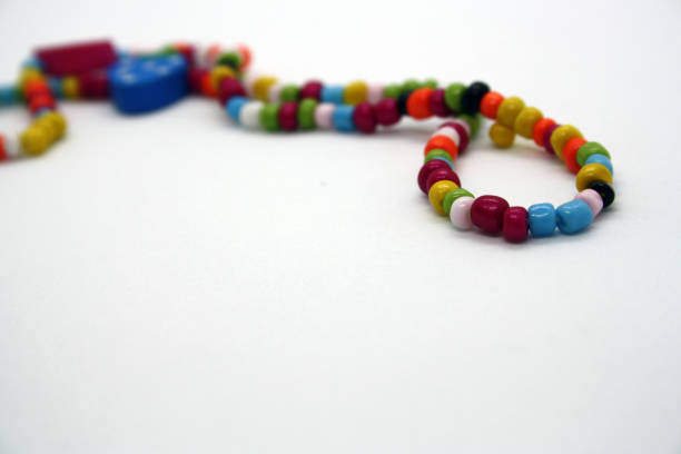 istock A bracelet made of beads on a white background. 1301169604