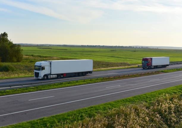 istock Truck with semi-trailer driving along highway 1301170062