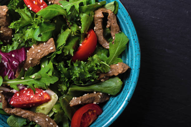 istock Healthy salad with beef cherry tomatoes 1301173671