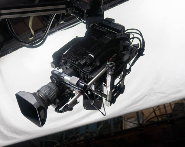 istock close up of video camera in TV studio 1301178590