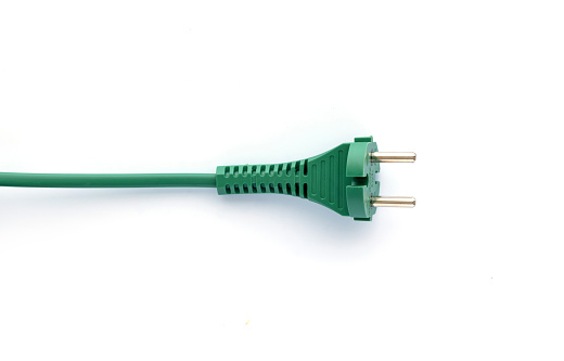 Straight green power cable with plug on white with shadow