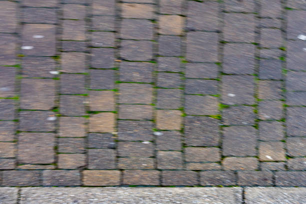 Deliberate in camera motion blur cobbles for use as a textured background.