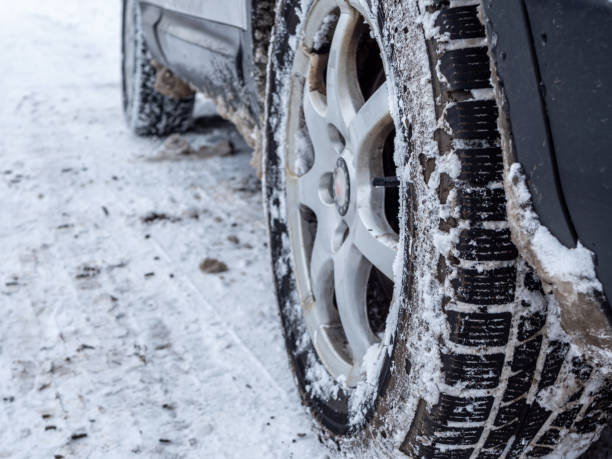 istock Winter tires with tread in the snow 1301180185
