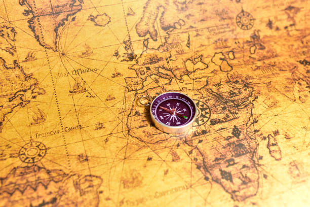 istock Compass on map. Tourist compass for orientation on the terrain. 1301183331