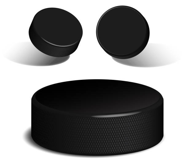 istock Realistic rubber hockey puck. 3D image of hockey puck lying on ice and in flight. Vector 1301187095
