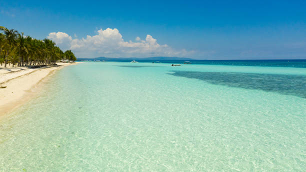 istock Sandy beach and tropical sea. Panglao island, Philippines 1301187177