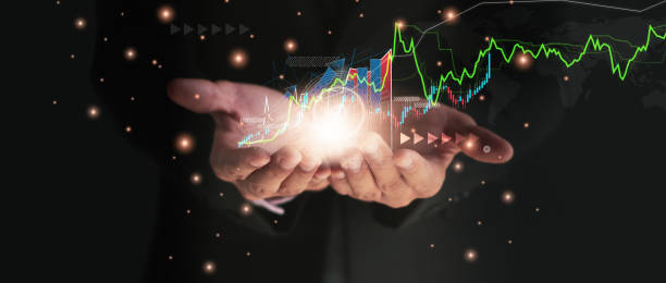 istock Businessman using hand holding symbol arrow up,with stock graph and chart background,concept business and investment,Stock market and the strategy for making market plan and stock market fluctuations 1301188725