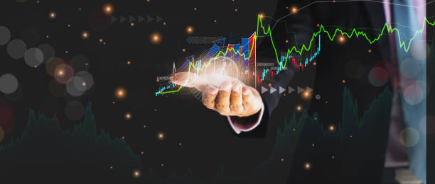 istock Businessman using hand holding symbol arrow up,with stock graph and chart background,concept business and investment,Stock market and the strategy for making market plan and stock market fluctuations 1301188735