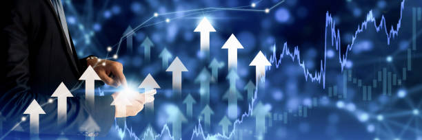 istock Businessman using holding symbol arrow up,stock graph and chart background,concept growth business and investment,Stock market and strategy for making market plan and stock market fluctuations 1301188809