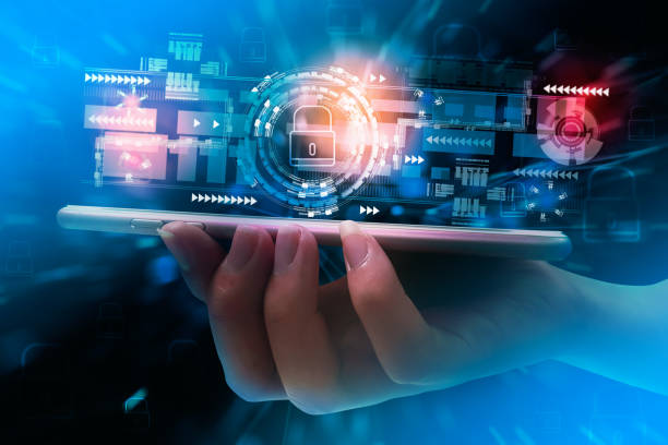 istock Business woman holding smartphone,smart padlock and shield,interface virtual screen,concept preventing website attack,financial information cyber security,crime,prevention Internet based attack 1301188874