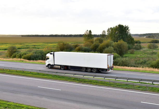 istock Lorry truck driving along highway 1301189479