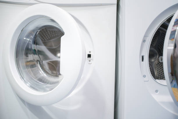 istock open door of an empty washing machine close up 1301192675
