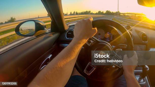 Pov First Person Shot Of Cruising Down The Freeway In A Porsche At Sunset Stock Photo - Download Image Now