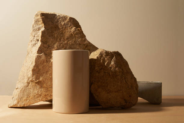 istock Stone and a piece of tile podium on a beige background 1301194377