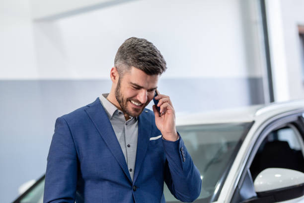 istock Businessman buying a car 1301196379