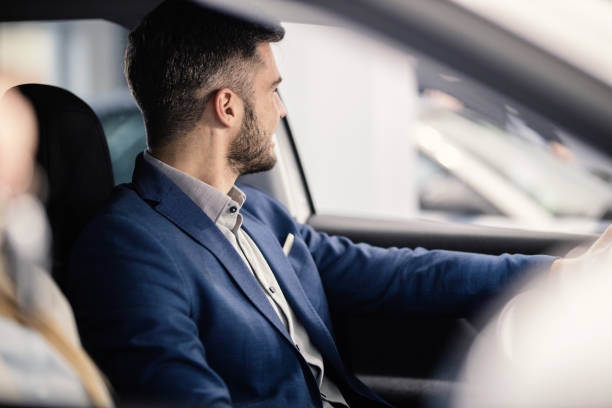 istock Businessman buying a car 1301196430