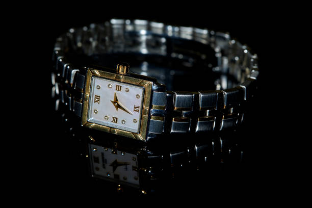 istock Women`s wrist watch with gold and diamonds 1301197537