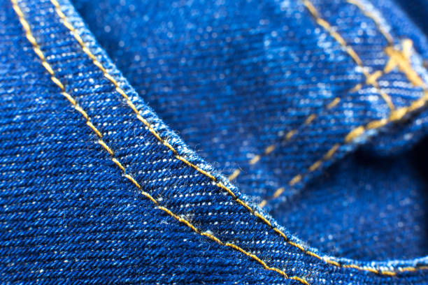istock Pocket of blue hipster jeans material. Denim Cloth texture background. 1301198642