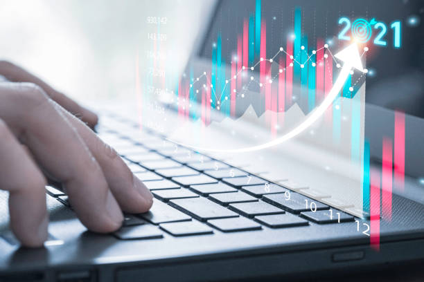istock Business investor using computer laptop to analysis beautiful virtual stock market chart , business analyze by use technology concept. 1301203610