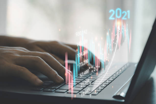 istock Business investor using computer laptop to analysis beautiful virtual stock market chart , business analyze by use technology concept. 1301205543