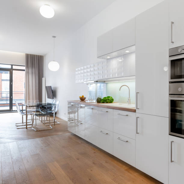 istock Kitchen with white furniture 1301206533
