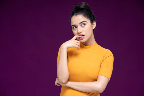 portrait of young woman, stock photo - hair bun hairstyle beautiful looking imagens e fotografias de stock