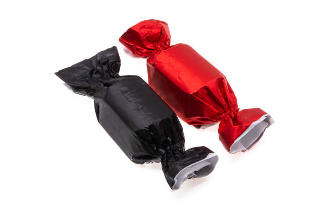 istock chocolate candies in wrapper isolated 1301218351